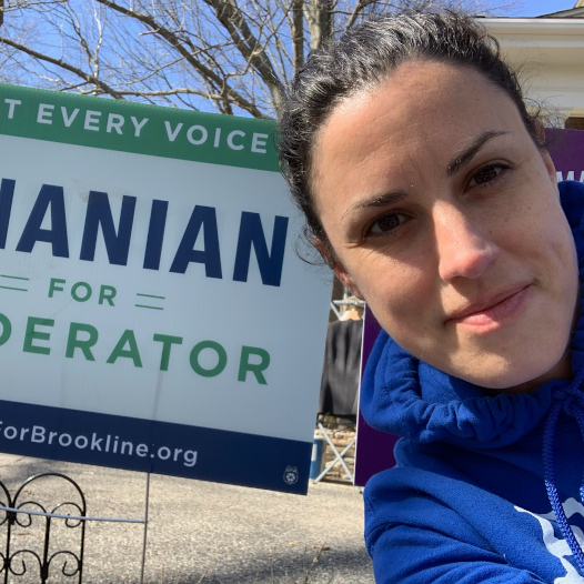 Bonnie Bastien with a yard sign!